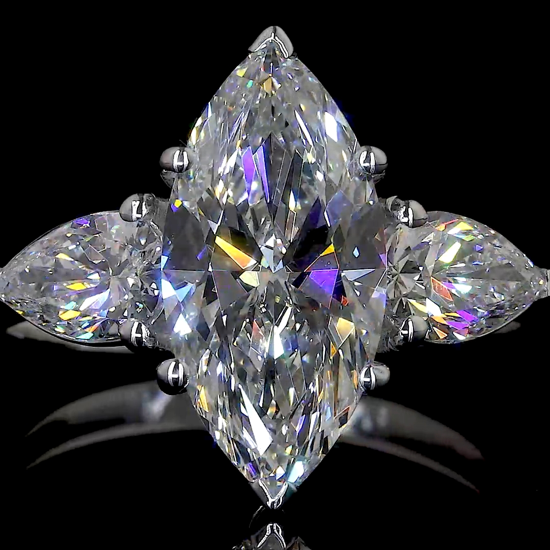 Marquise Diamond Ring with Pear Side Stones in White Gold