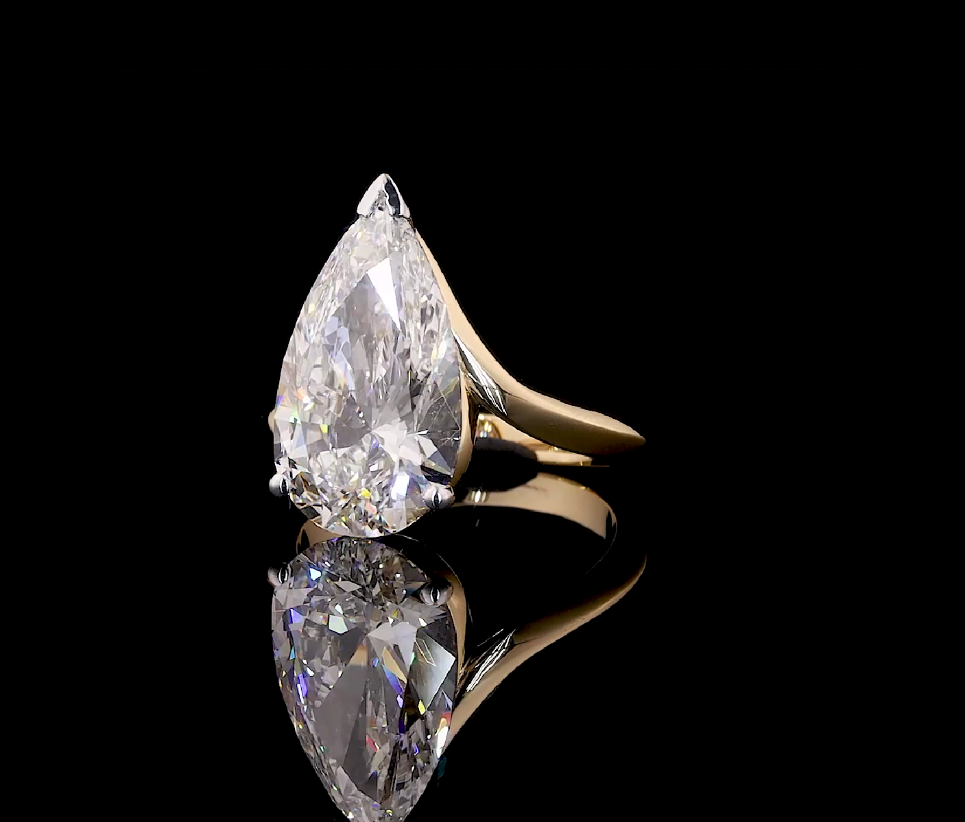 pear solitaire diamond ring