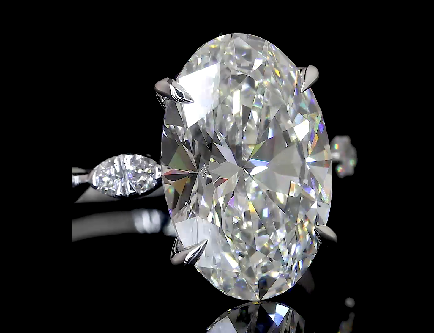 Oval-Cut Diamond Ring with Marquise Band in White Gold