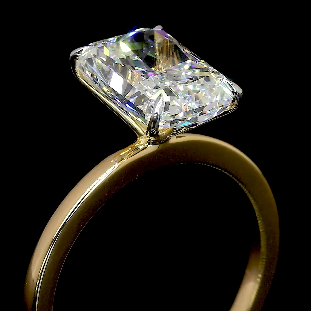 Emerald Solitaire Diamond Ring