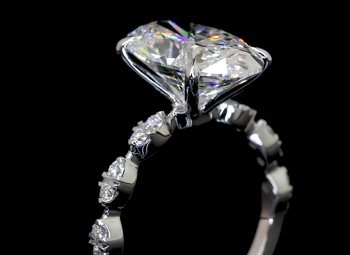 Oval-Cut Diamond Ring with Marquise Band in White Gold