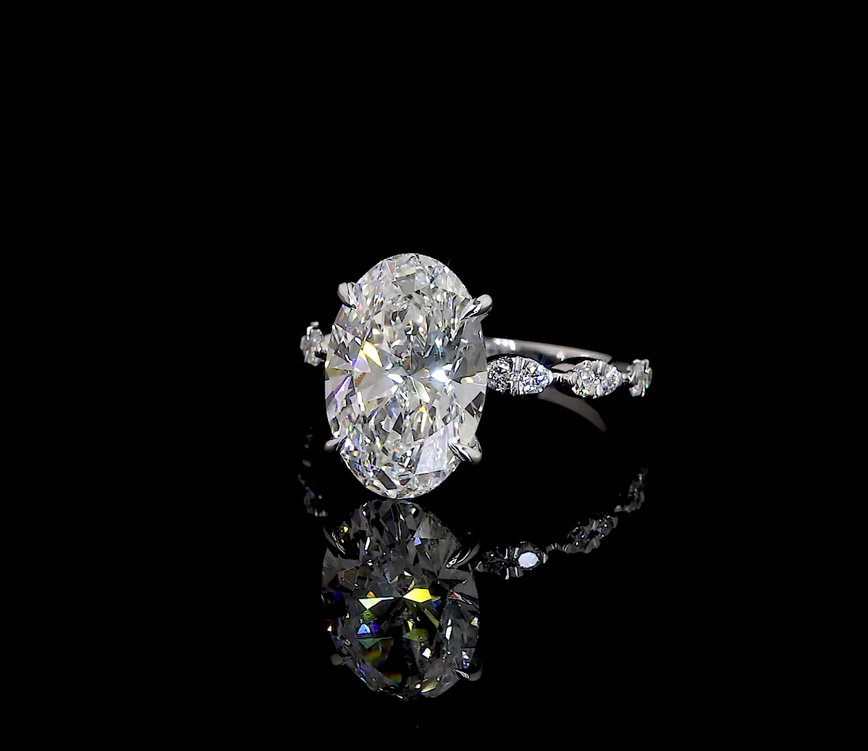 Oval-Cut Diamond Ring with Marquise Band in White Gold