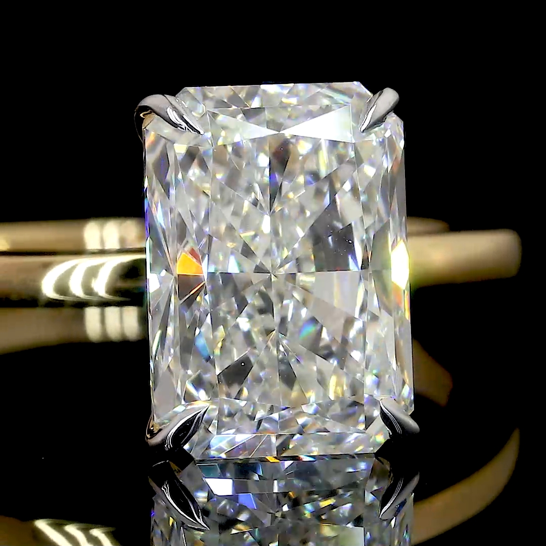 Emerald Solitaire Diamond Ring