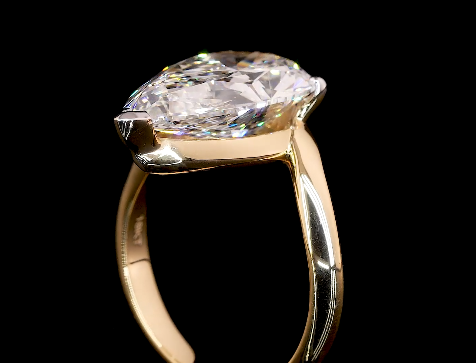 pear solitaire diamond ring